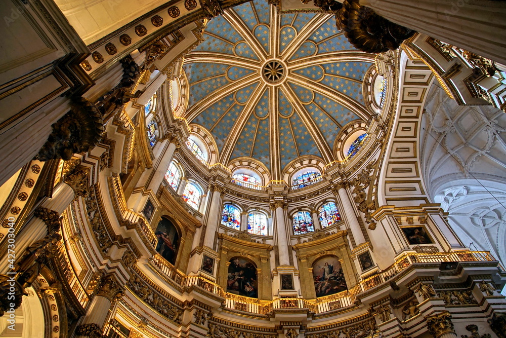View of the dome Of the Cathedral of the Incarnation with its delicate stained glass windows in Granada, Spain