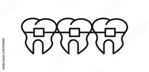Teeth in brackets icon. Dental care, stomatology services, braces, linear design. Vector illustration. EPS 10