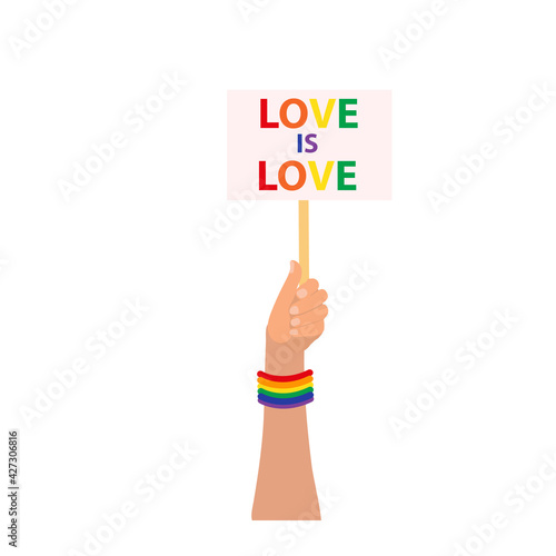 LGBT Pride Month. Hand holds a poster with the inscription love is love. Vector illustration