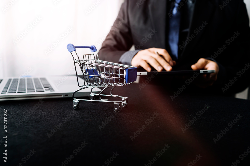 shopping online payment by using laptop.hands holding credit card and using laptop. online shopping concept.