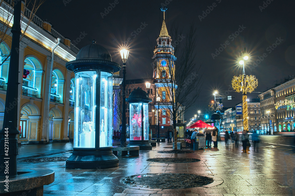 the main city street of the Russian city of St. Petersburg in the light of festive street illumination