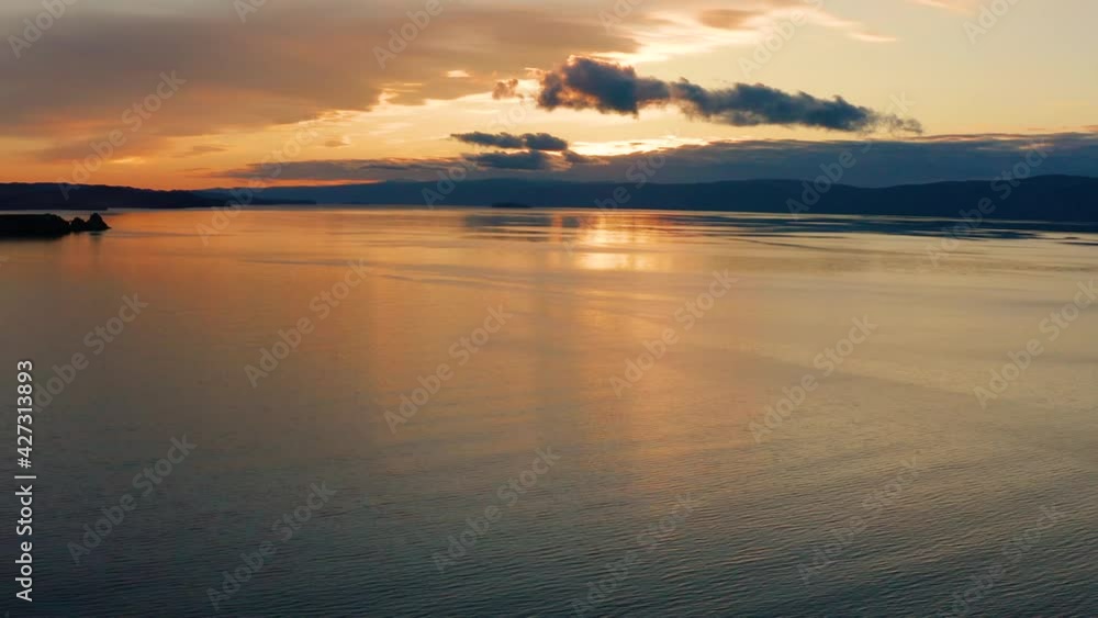 Lake Baikal in autumn. Olkhon Island. Small Sea strait. Aerial view. Lake Baikal in autumn. Olkhon Island. Small Sea strait. Aerial view.
