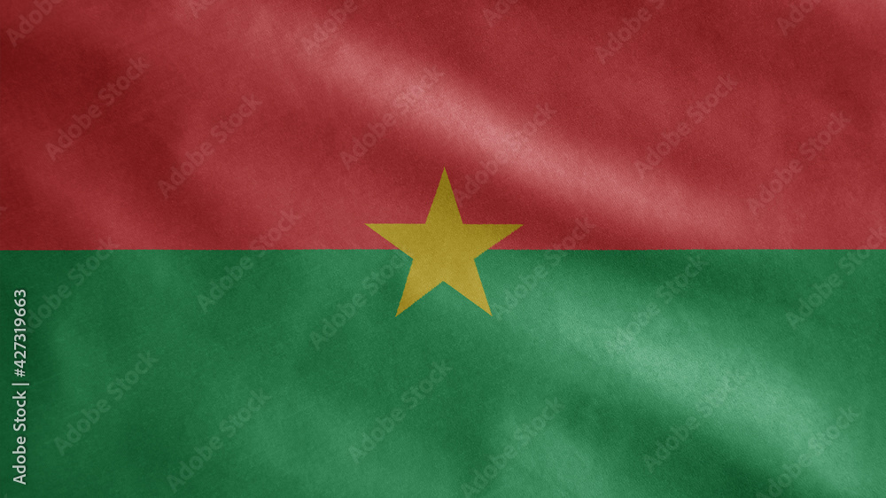 Burkina Faso flag waving in the wind. Close up of Burkinabe banner blowing, soft silk. Burkina Faso flag waving in the wind. Close up of Burkinabe banner blowing, soft silk.