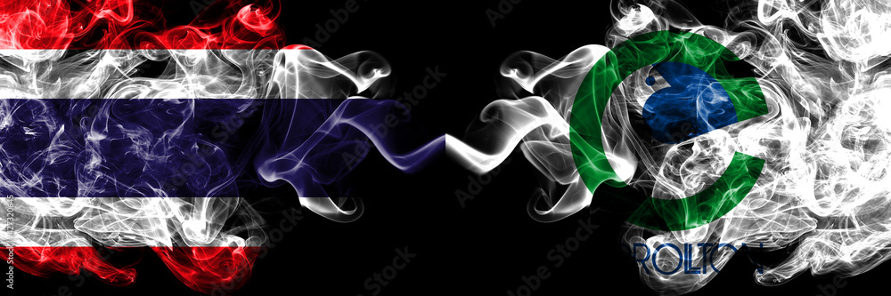 Thailand, Thai vs United States of America, America, US, USA, American, Carrollton, Texas smoky mystic flags placed side by side. Thick colored silky abstract smokes flags. Thailand, Thai vs United States of America, America, US, USA, American, Carrollton, Texas smoky mystic flags placed side by side. Thick colored silky abstract smokes flags.