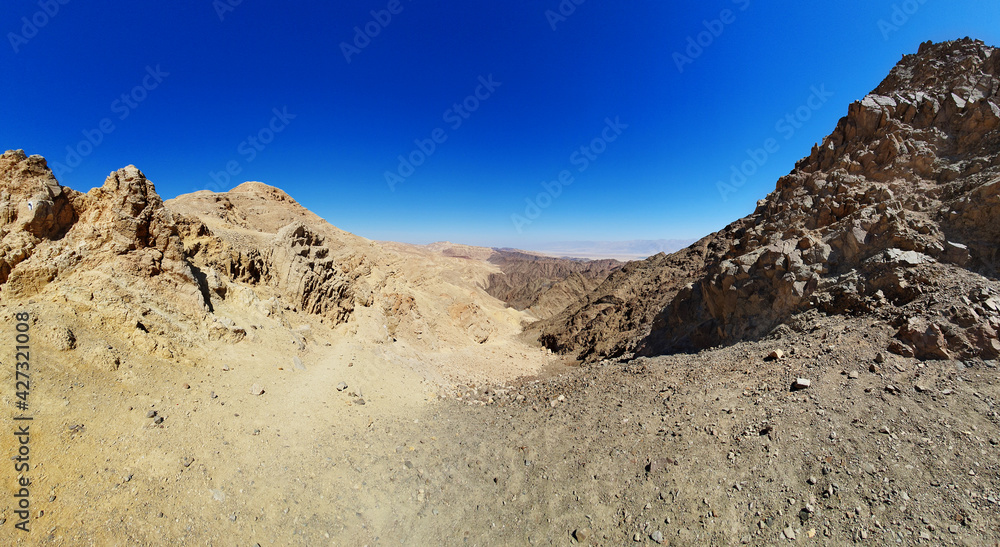 hiking trail in Eilat mountains. Red rock formations and boulders. Panoramic view over the trail on surrounding red mountains.
Eilat, Israel Israel, Eilat Mountains: Red Canyon