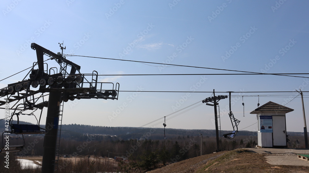metal chairlift cables on mountain spot