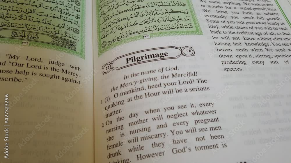 A slightly moving shot showing an english translation of the quranic chapter Pilgrimage A slightly moving shot showing an english translation of the quranic chapter Pilgrimage