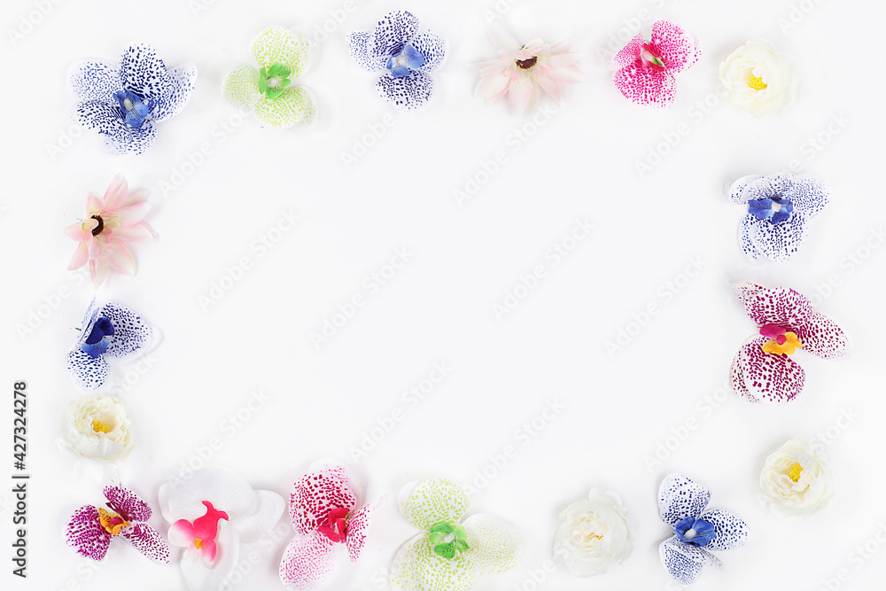 Abstract flower arrangement, spring background. Orchid flowers frame, minimal holiday concept. Greeting card for womens day or mothers day, happy birthday, wedding, banner for screen