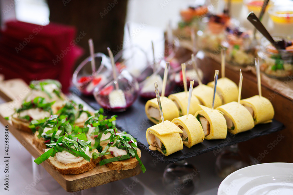 Delicious snacks at the banquet. Catering on banquet. Delicious snacks at the banquet. Catering on banquet.
