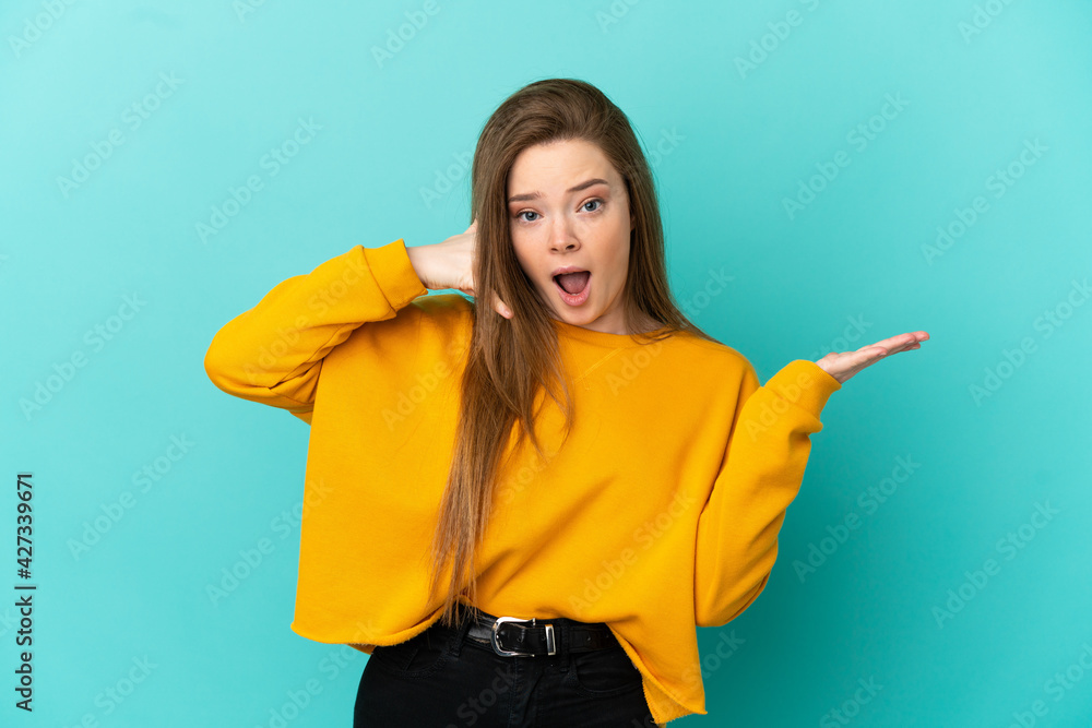 Teenager girl over isolated blue background making phone gesture and doubting Teenager girl over isolated blue background making phone gesture and doubting