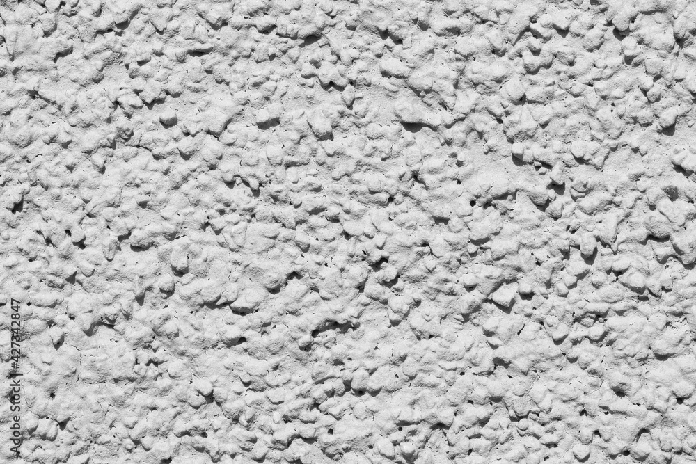 Grey structural facade plaster. Lamb fur style plaster with grainy structure Grey structural facade plaster. Lamb fur style plaster with grainy structure