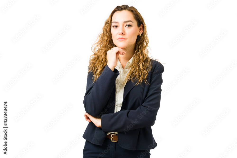 Portrait of a reflexive young woman with professional clothes Portrait of a reflexive young woman with professional clothes