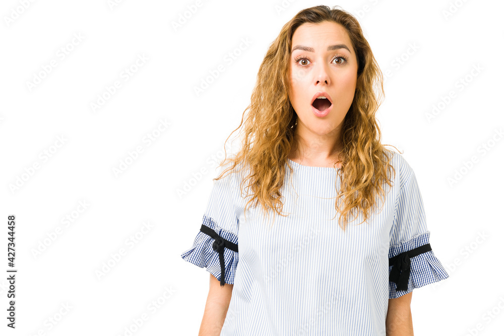Hispanic woman can't believe the news she heard Hispanic woman can't believe the news she heard