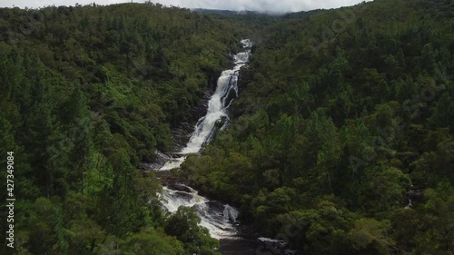 Aerial drone view towards the Colnett Waterfall in middle of Grande Terre Jungle, New Caledonia photo