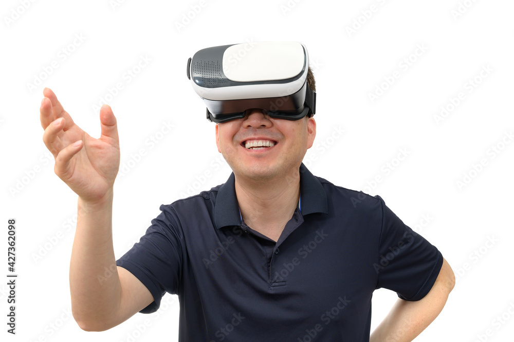 Man wearing virtual reality goggles. Studio shot, white background. Man wearing virtual reality goggles. Studio shot, white background.