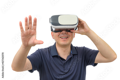 Man wearing virtual reality goggles. Studio shot, white background.