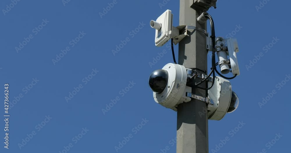 Outdoor security cameras on a pole for surveillance Outdoor security cameras on a pole for surveillance