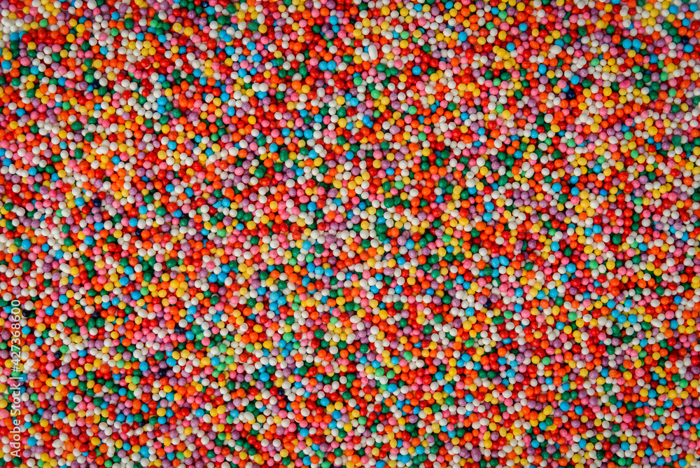 Colored sprinkles background or texture.