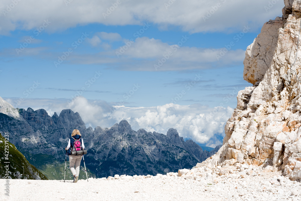Fototapeta premium Hiker on the mountain pass
