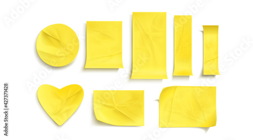 Yellow paper stickers, crumpled sticky notes. Vector realistic set of empty glued labels with curl corners. Circle, rectangle and heart shape adhesive tags isolated on white background