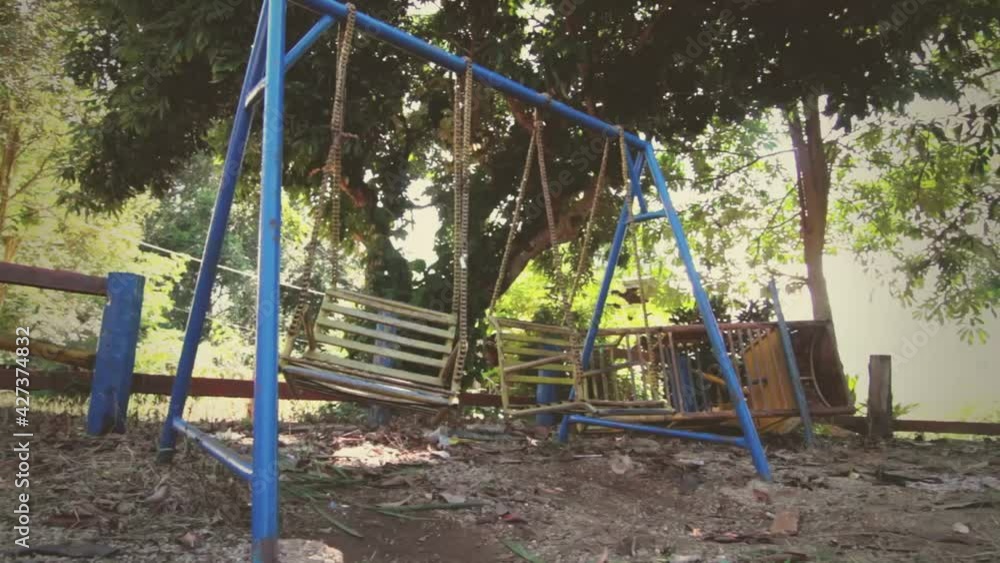 deserted ghetto playground swings deserted ghetto playground swings