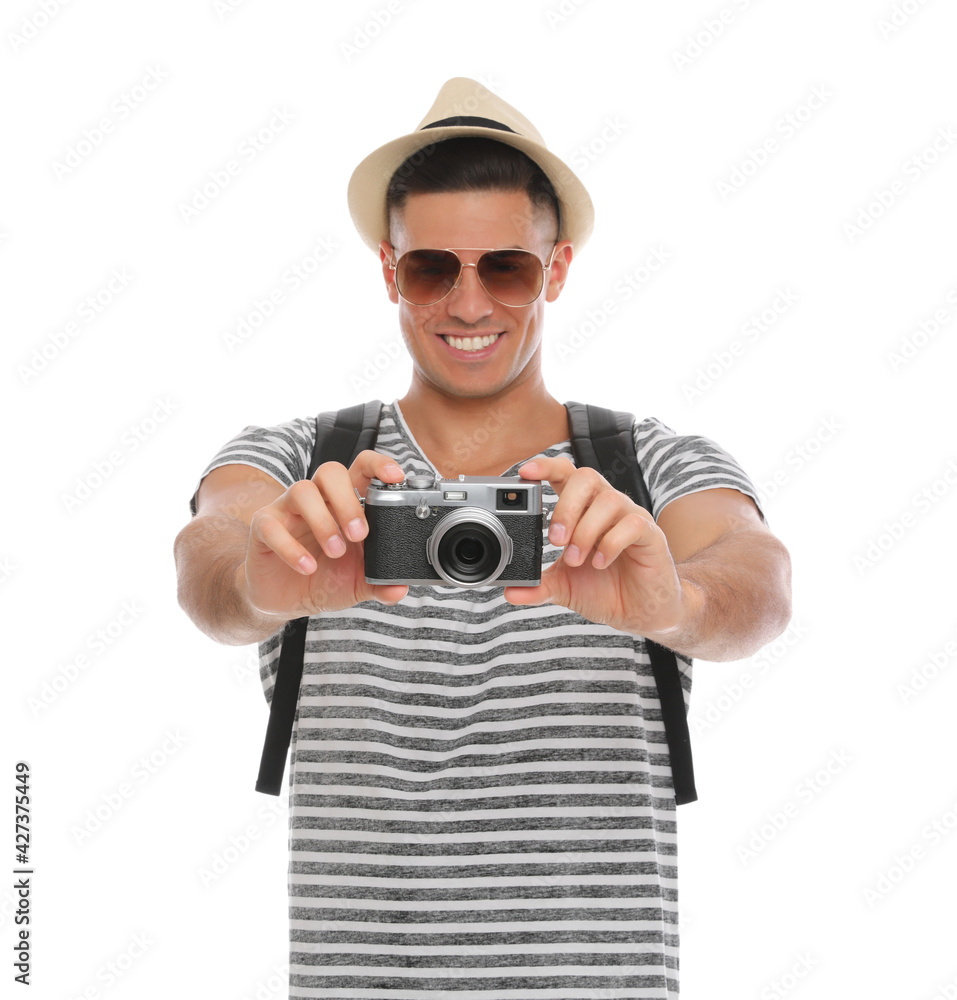 Man with straw hat taking picture on white background. Summer travel Man with straw hat taking picture on white background. Summer travel