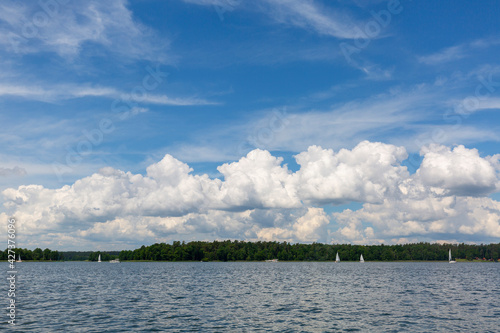 Fototapeta Naklejka Na Ścianę i Meble -  Lake in Polish Masuria, sailing yachts on a sunny day, Masuria, Masurian Lakeland, Poland