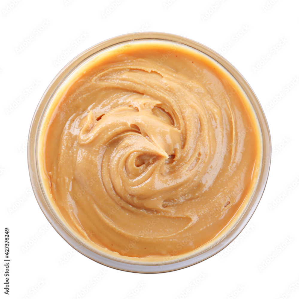 Delicious peanut butter in bowl isolated on white, top view - obrazy, fototapety, plakaty 