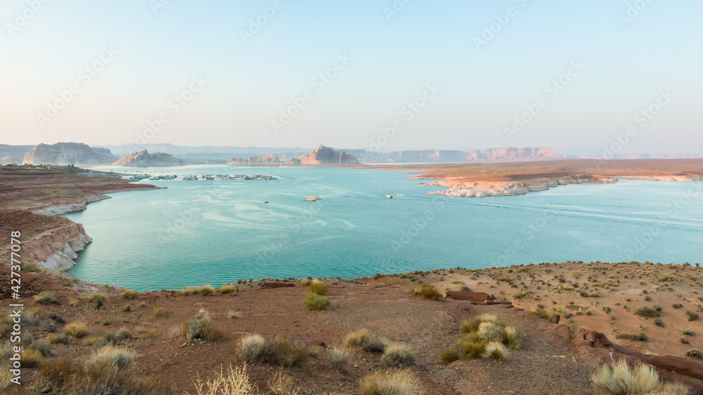 Sunset at the famous Lake Powell, USA. Wide view of the bay and the water.