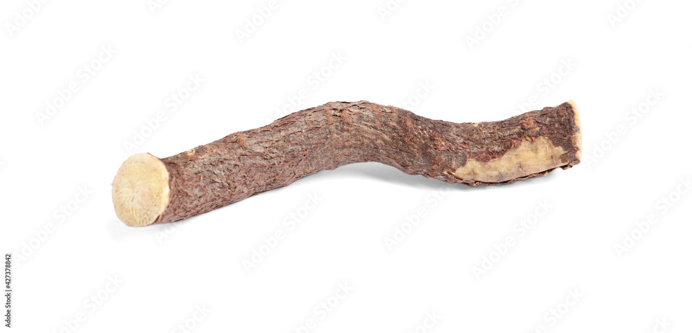 Dried stick of liquorice root isolated on white Dried stick of liquorice root isolated on white