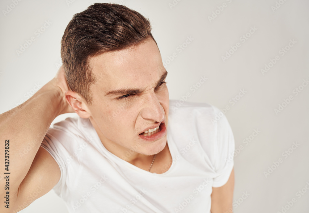 Nervous man touches his head stress Model of emotion Nervous man touches his head stress Model of emotion