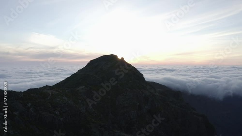 Pico Ruivo mountain with cloud landscape at sunrise in Madeira