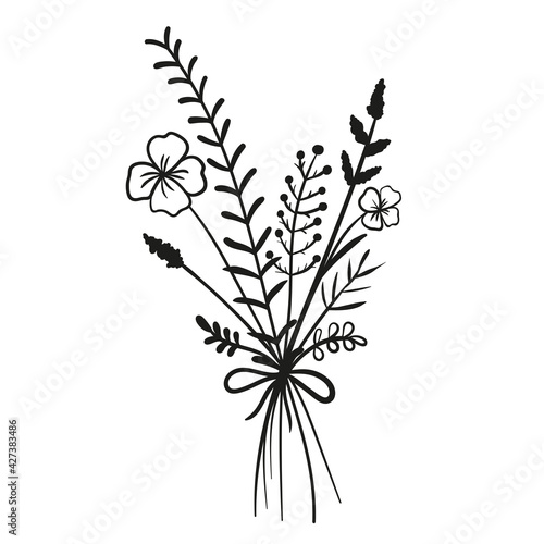 A cute bouquet of wildflowers tied with a ribbon.