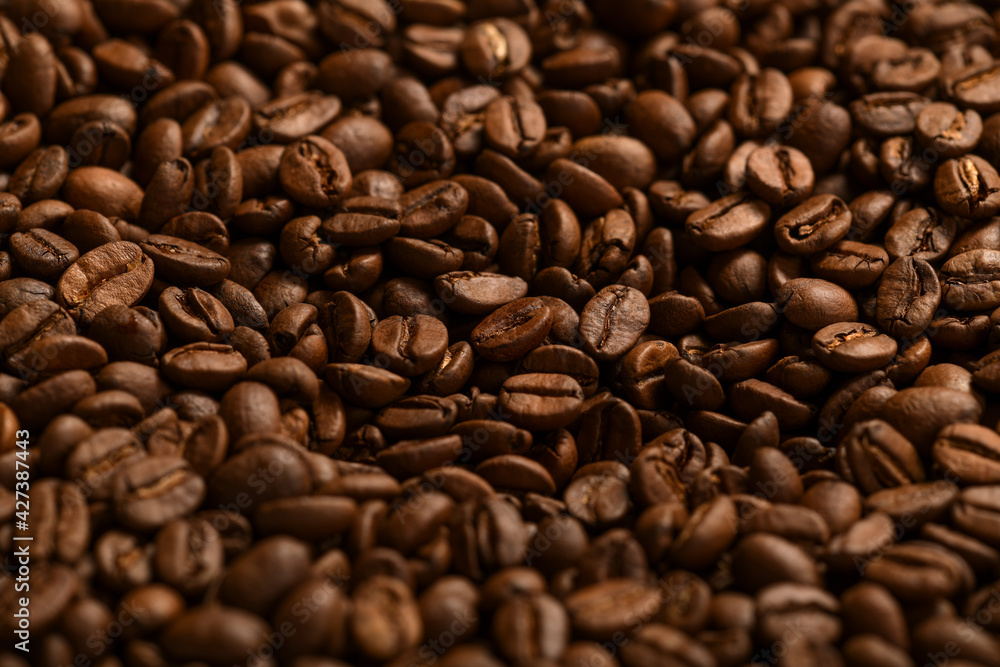 Pile of dark roasted coffee beans