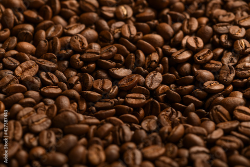 Pile of dark roasted coffee beans