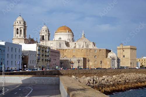 Paseo Campo del Sur Promenade with The Cadiz Cathedral called Santa Cruz or Catedral Nueva (New Cathedral) in the background 