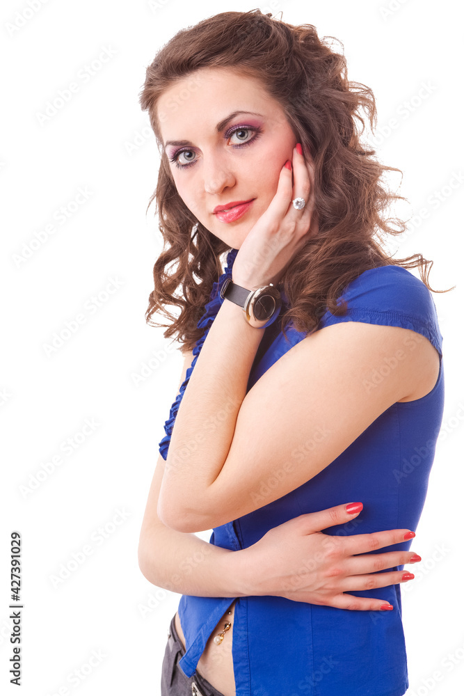 Portrait of Young Confident Caucasian Female in Blue Shirt Posing with Hands Folded Against White Background. Portrait of Young Confident Caucasian Female in Blue Shirt Posing with Hands Folded Against White Background.