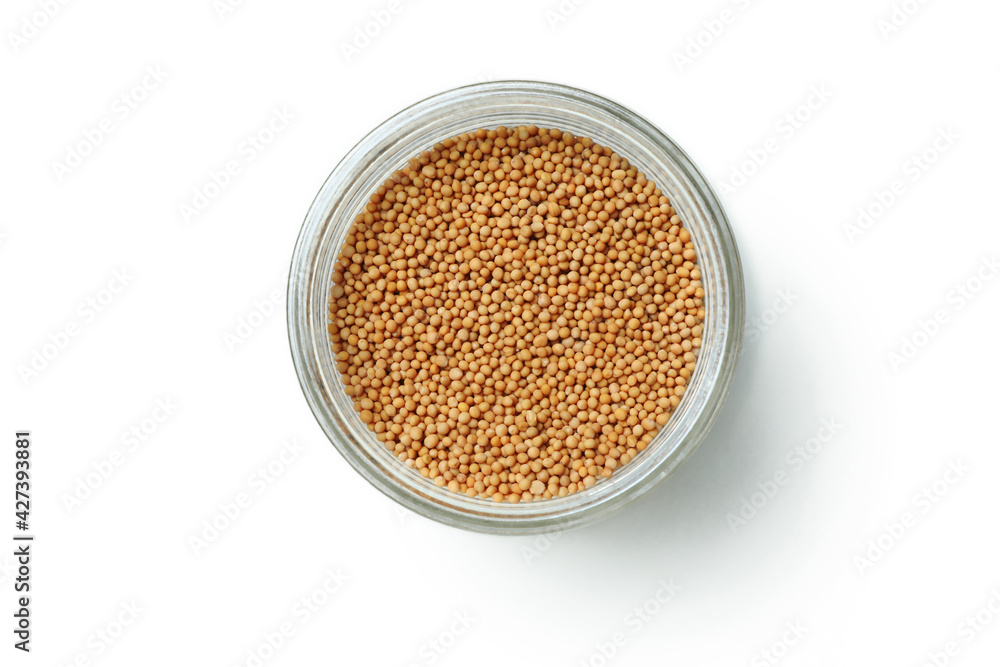 Glass jar with mustard seeds isolated on white background Glass jar with mustard seeds isolated on white background