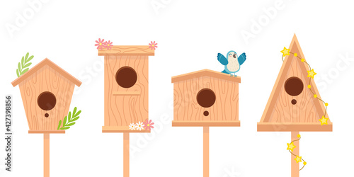 Set of wooden birdhouses vector clip art. Isolated illustration of home for birds in flat style.