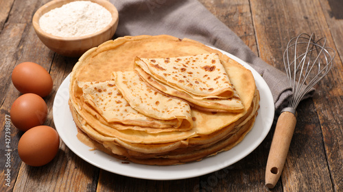 Photos crepe with fresh ingredient on wood background