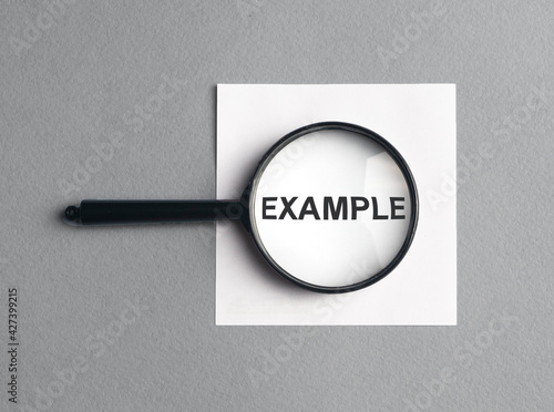 Word example on paper, cases in business or education photo