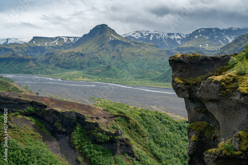 Dramatic clouds coming to the valley of Thorsmork, southern Iceland. View from the road down off Valahnukur. Laugavegur trail. photo