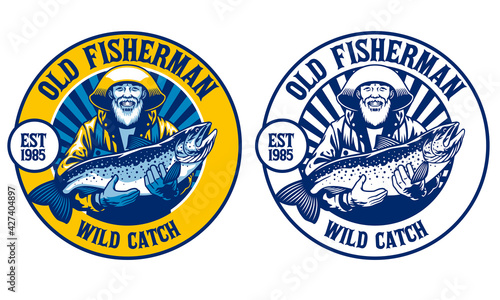 old fisherman with his big catch salmon fish