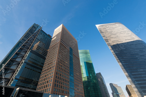 Modern Office buildings and blue sky. Japan, Shinjuku Ward, Shiodome, Tokyo. Shiodome, a redeveloped business and leisure district near Tokyo Bay. © fazon