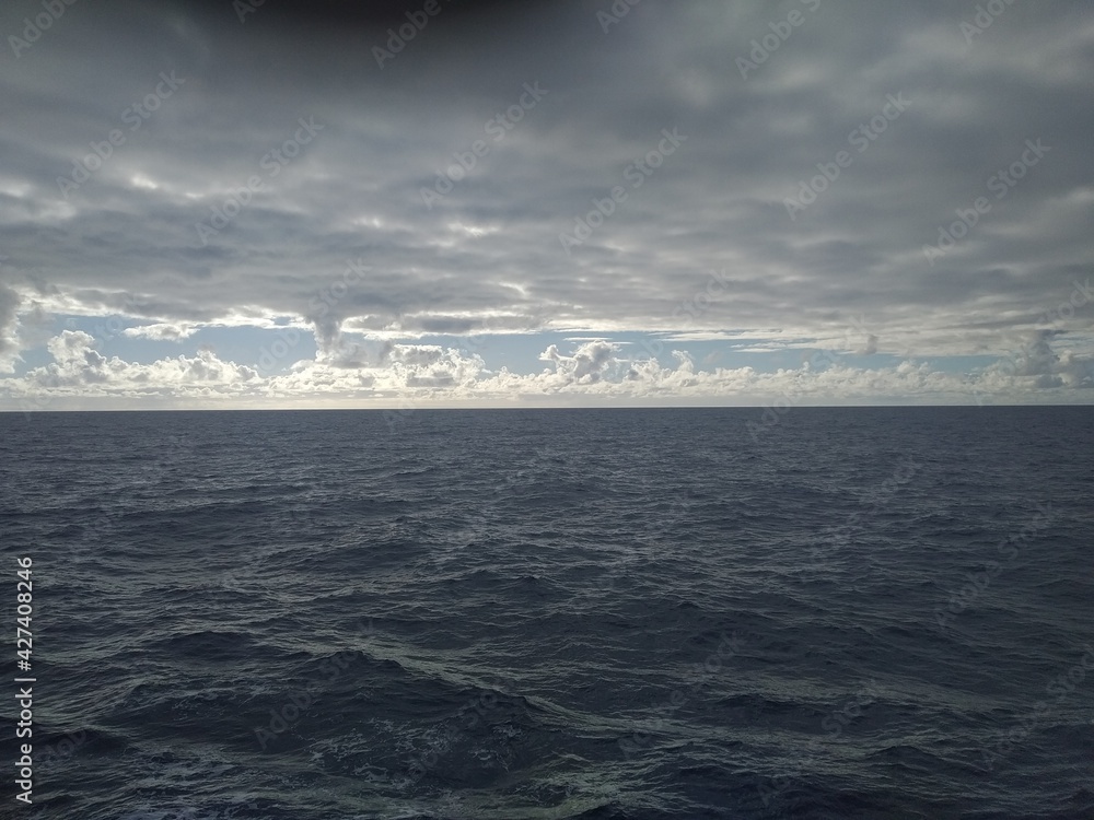 Fototapeta premium Atlantic Ocean, raging waves, thick clouds.