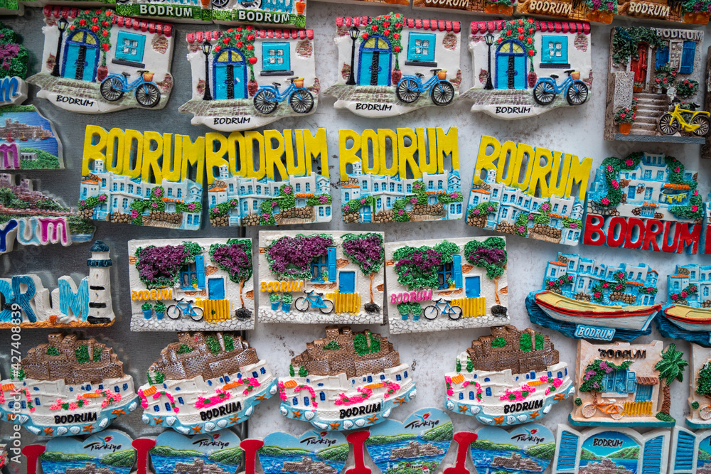 Naklejka premium Turkey, Bodrum.Ceramic greek mill souvenirs on the shop window.