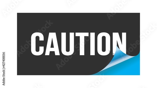 CAUTION text written on black blue sticker.