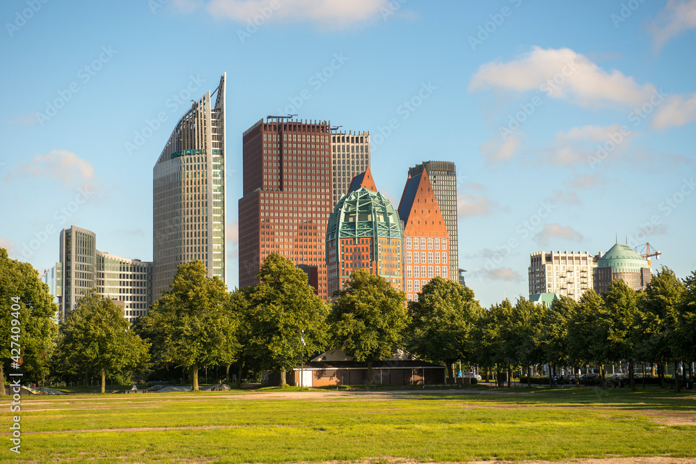 Fototapeta premium The skyline of The Hague, the Netherlands, with office buildings seen from malieveld