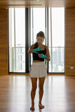 Asian woman kick boxer preparing for exercise at gym
