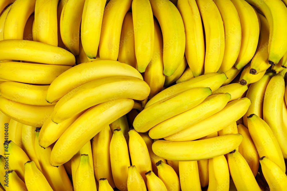 Background of many banana pieces, overhead view, studio food photography. Background of many banana pieces, overhead view, studio food photography.